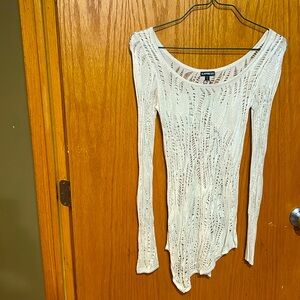 Express xsmall women’s sweater. Beige & fitted, bottom has asymmetrical hemline.